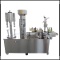 Semiautomatic bottling line for wine. Filler, corker, labeller and capsuling machine